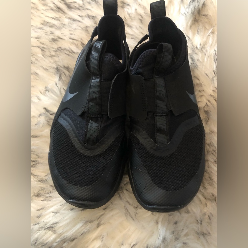 Boys all black Nike shoes